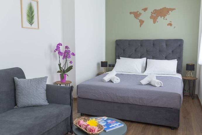 Imagen de la habitación del Hotel The Athens Version Luxury Suites. Foto 2