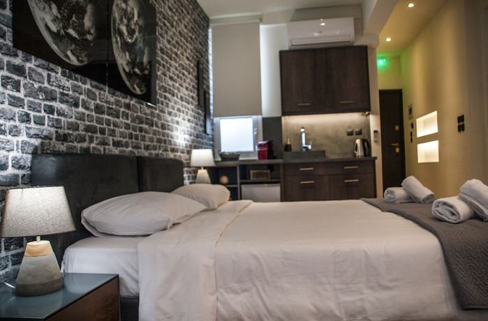 Imagen de la habitación del Hotel The Athens Version Luxury Suites. Foto 3