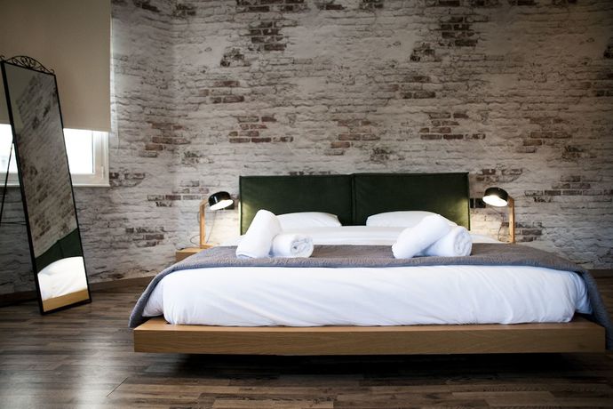 Imagen de la habitación del Hotel The Athens Version Luxury Suites. Foto 5