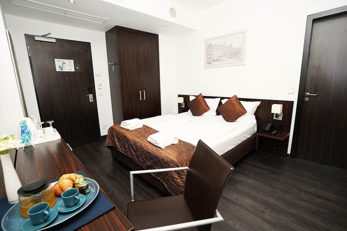 Imagen de la habitación del Hotel The Atrium, Bahnhofsviertel. Foto 5