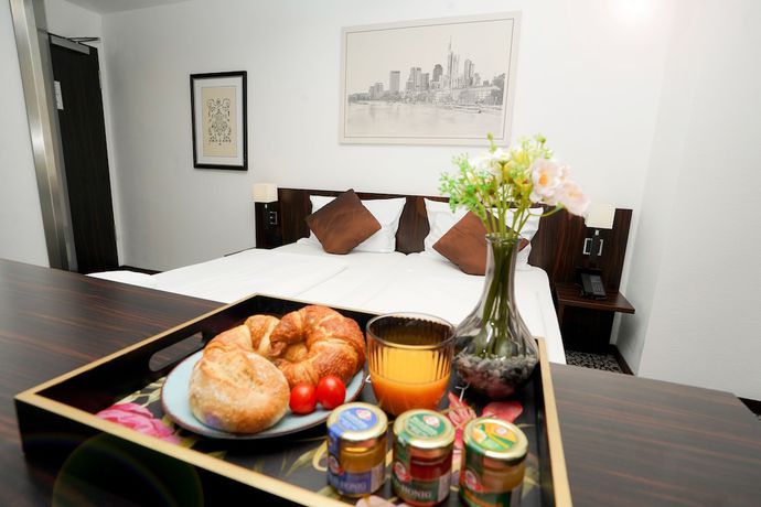 Imagen de la habitación del Hotel The Atrium, Bahnhofsviertel. Foto 10