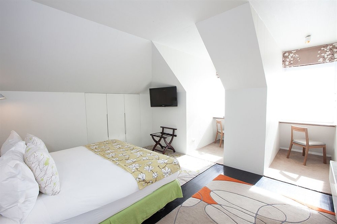 Imagen de la habitación del Hotel The Aubrey Santiago. Foto 6