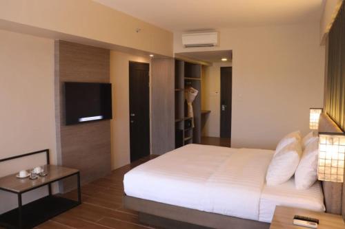 Imagen general del Hotel The Aurora Subic Managed By HII, Banicain. Foto 16