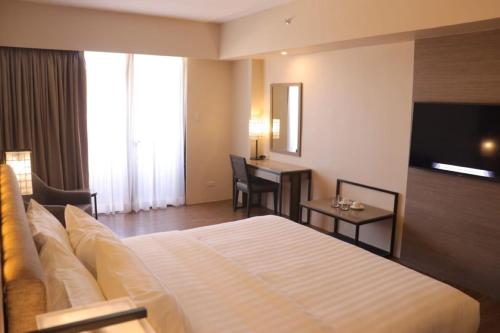 Imagen general del Hotel The Aurora Subic Managed By HII, Banicain. Foto 17