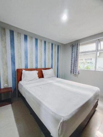 Imagen de la habitación del Hotel The Aurora by Makati. Foto 13