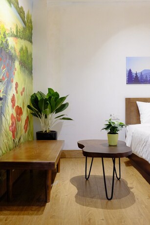 Imagen de la habitación del Hotel The Autumn Homestay. Foto 12