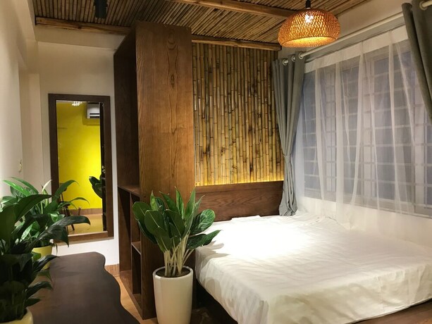 Imagen de la habitación del Hotel The Autumn Homestay. Foto 15