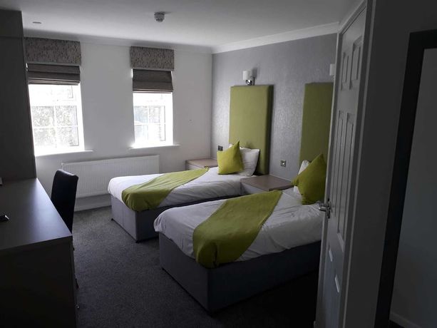 Imagen de la habitación del Hotel The Avenue. Foto 10