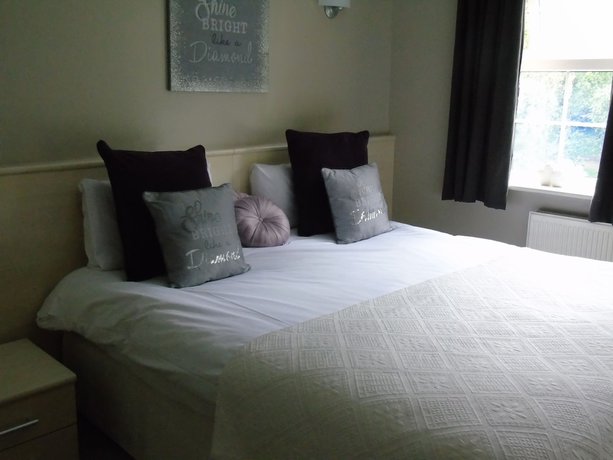 Imagen de la habitación del Hotel The Avenue. Foto 12
