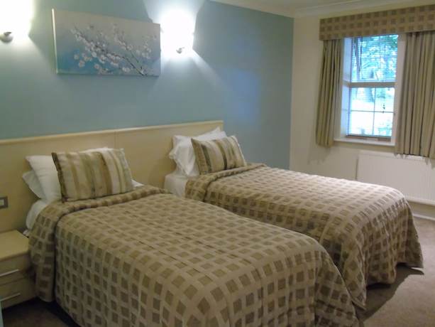Imagen de la habitación del Hotel The Avenue. Foto 14