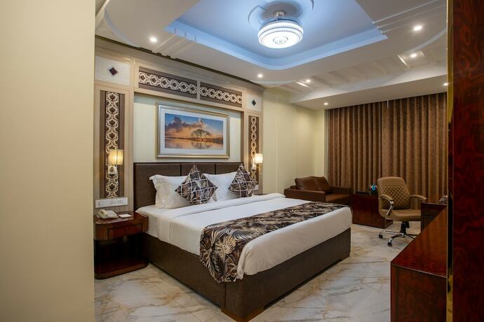 Imagen de la habitación del Hotel The Avenue Grand. Foto 13
