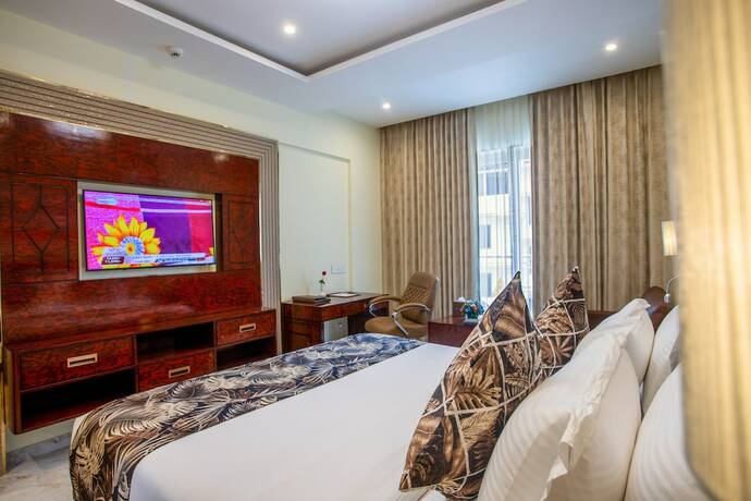 Imagen de la habitación del Hotel The Avenue Grand. Foto 15