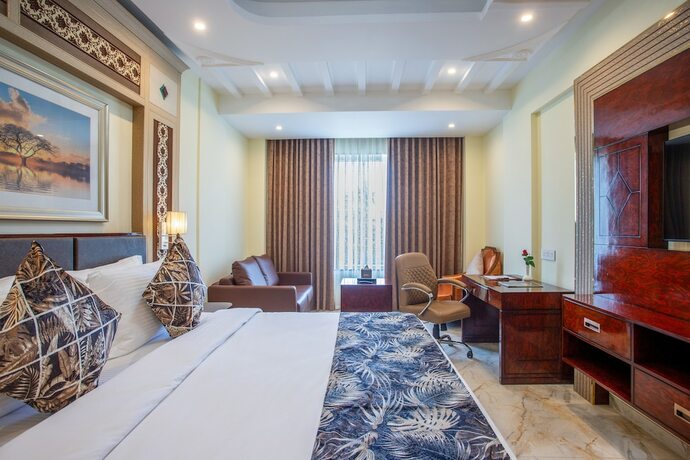 Imagen de la habitación del Hotel The Avenue Grand. Foto 18