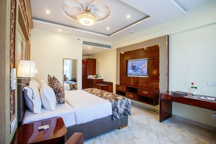 Imagen de la habitación del Hotel The Avenue Grand. Foto 19