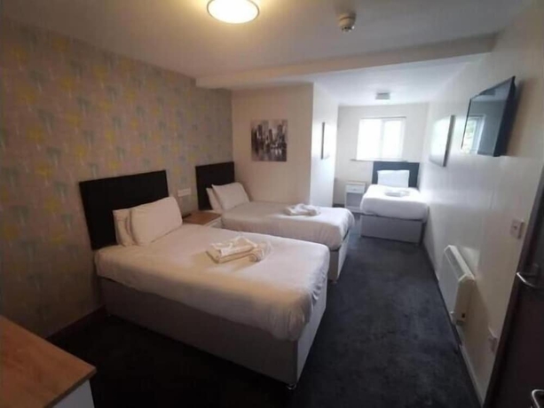 Imagen de la habitación del Hotel The Avenue Lodge. Foto 15
