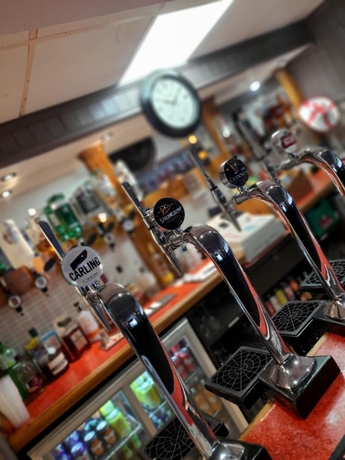 Imagen del bar/restaurante del Hotel The Avenue Lodge. Foto 4