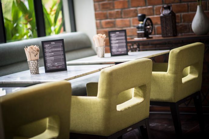 Imagen del bar/restaurante del Hotel The Aviary. Foto 4