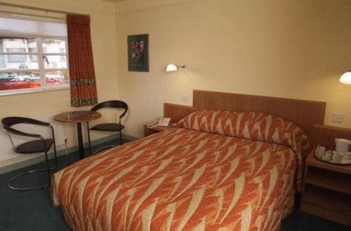 Imagen de la habitación del Hotel The Aviator. Foto 8