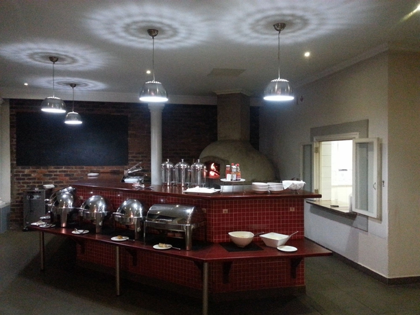 Imagen del bar/restaurante del Hotel The Aviator OR Tambo International. Foto 4