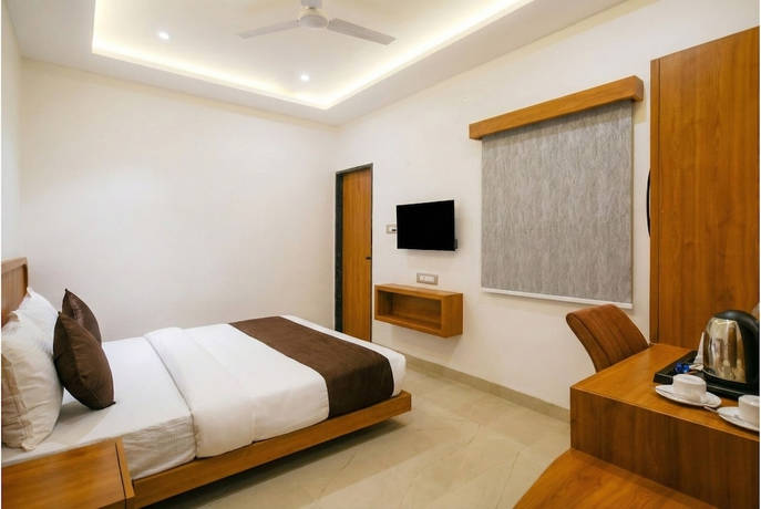 Imagen de la habitación del Hotel The Avinya Stay. Foto 1