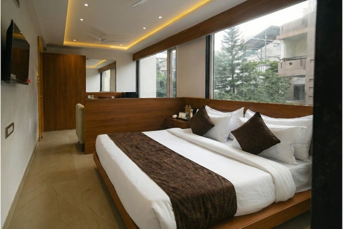 Imagen de la habitación del Hotel The Avinya Stay. Foto 10