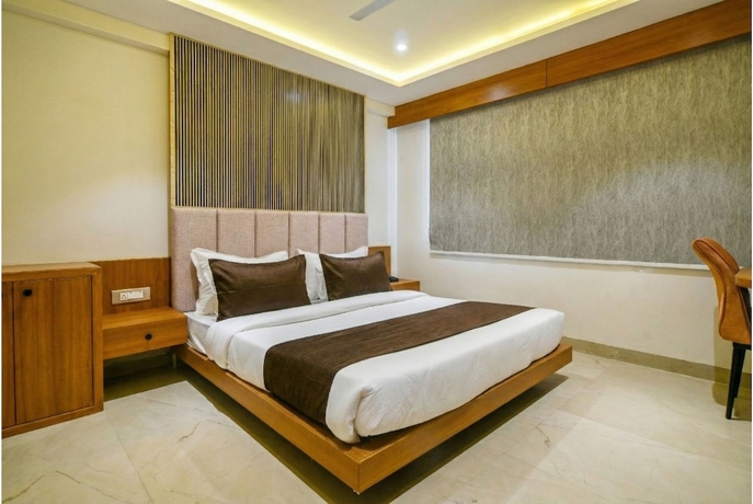 Imagen de la habitación del Hotel The Avinya Stay. Foto 11