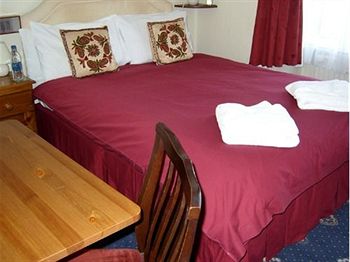 Imagen de la habitación del Hotel The Avondale. Foto 6