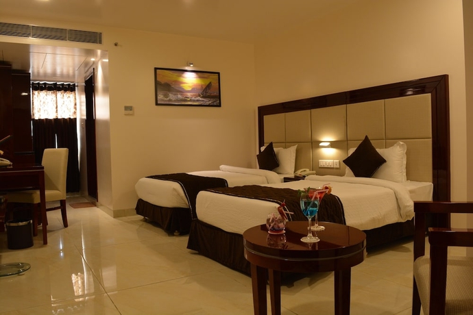 Imagen de la habitación del Hotel The Avr Hotels and Banquets. Foto 8