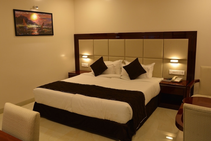 Imagen de la habitación del Hotel The Avr Hotels and Banquets. Foto 9