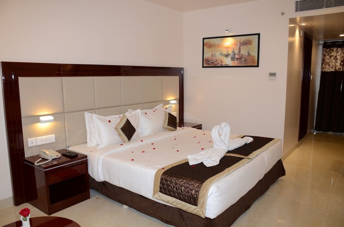 Imagen de la habitación del Hotel The Avr Hotels and Banquets. Foto 10