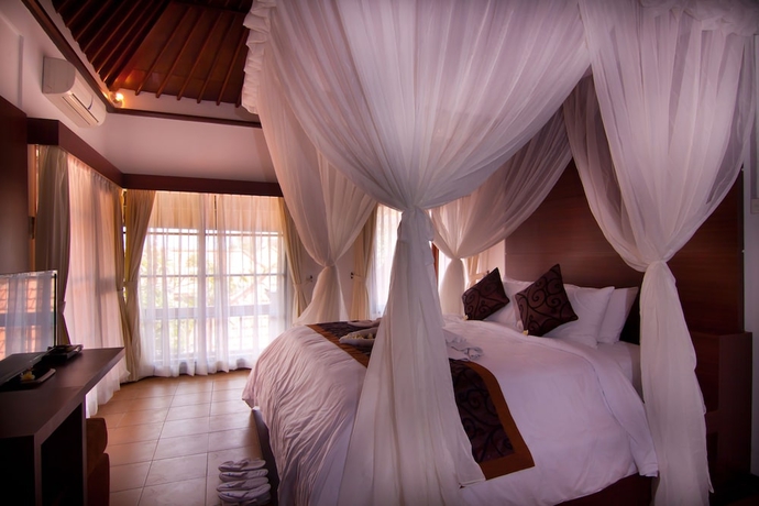 Imagen de la habitación del Hotel The Awan Villas. Foto 2