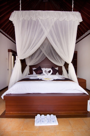 Imagen de la habitación del Hotel The Awan Villas. Foto 4