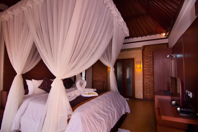 Imagen de la habitación del Hotel The Awan Villas. Foto 5