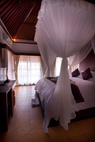 Imagen de la habitación del Hotel The Awan Villas. Foto 7