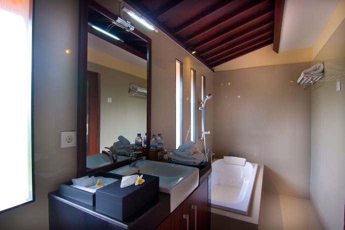 Imagen de la habitación del Hotel The Awan Villas. Foto 14