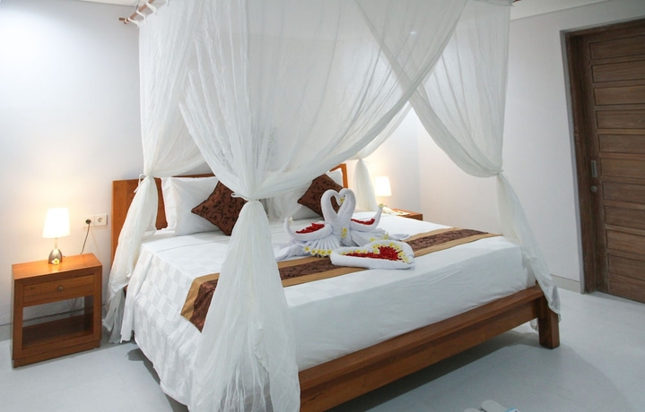 Imagen de la habitación del Hotel The Awandari Villas Seminyak. Foto 2