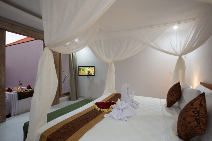 Imagen de la habitación del Hotel The Awandari Villas Seminyak. Foto 3