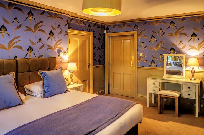 Imagen de la habitación del Hotel The Ayrlington. Foto 18