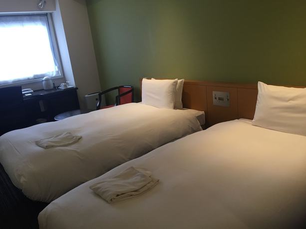 Imagen de la habitación del Hotel The B Hakata. Foto 6