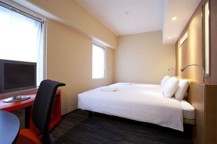 Imagen de la habitación del Hotel The B Kobe. Foto 11