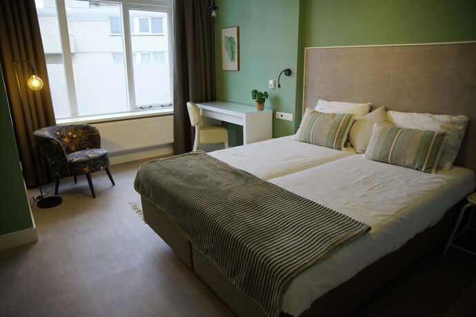 Imagen de la habitación del Hotel The BLOOM, NOORDWIJK. Foto 5