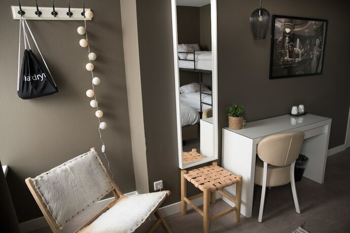 Imagen de la habitación del Hotel The BLOOM, NOORDWIJK. Foto 8