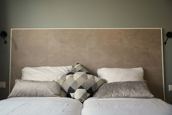 Imagen de la habitación del Hotel The BLOOM, NOORDWIJK. Foto 11
