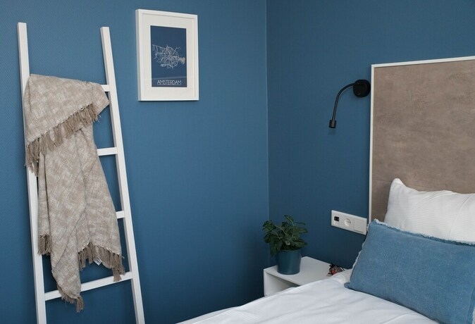 Imagen de la habitación del Hotel The BLOOM, NOORDWIJK. Foto 12