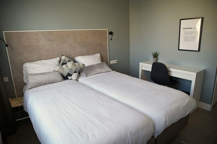 Imagen de la habitación del Hotel The BLOOM, NOORDWIJK. Foto 18