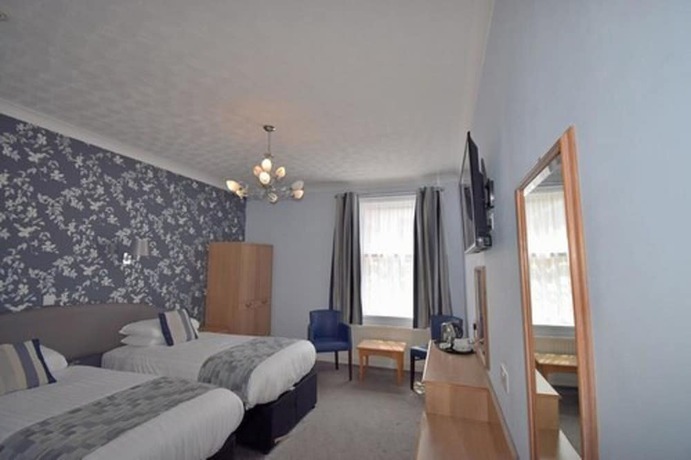 Imagen de la habitación del Hotel The Babbacombe. Foto 11