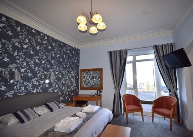 Imagen de la habitación del Hotel The Babbacombe. Foto 12