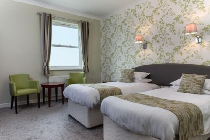 Imagen de la habitación del Hotel The Babbacombe. Foto 15