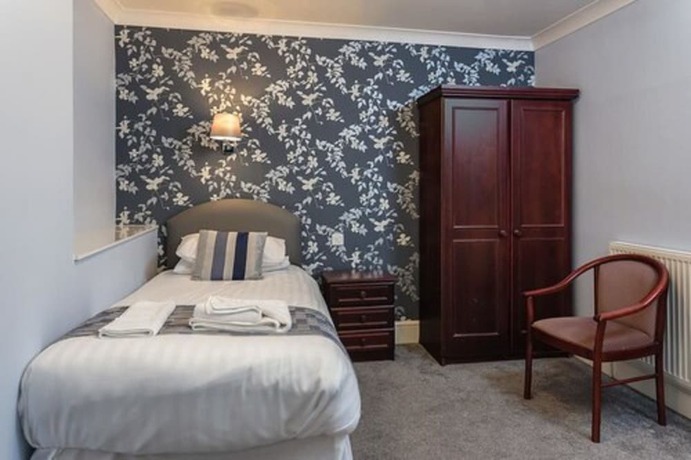 Imagen de la habitación del Hotel The Babbacombe. Foto 18