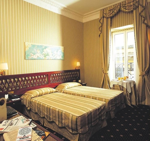 Imagen de la habitación del Hotel The Bailey's. Foto 7